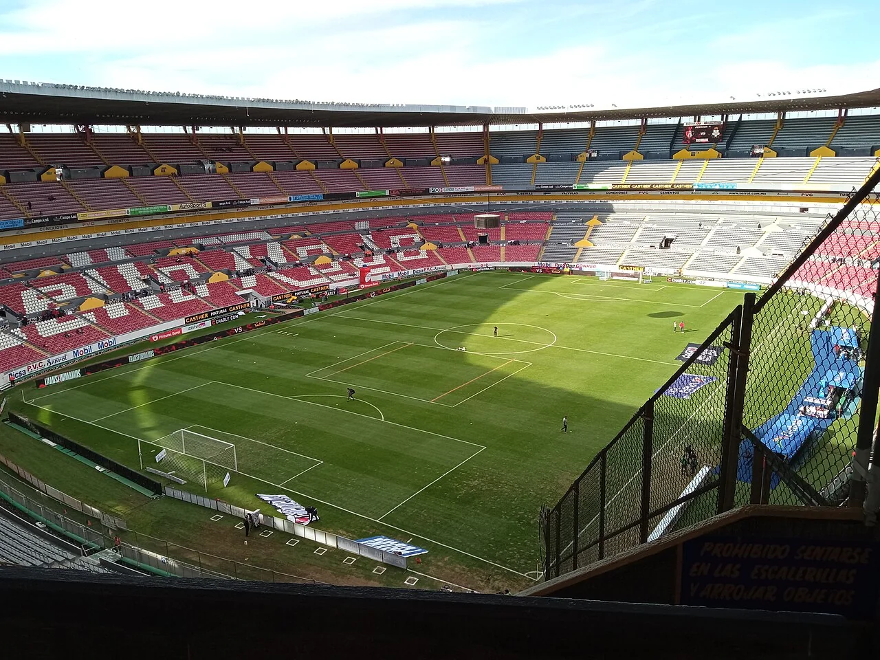 Supporters and pitch inside Estadio Jalisco before an Atlas match