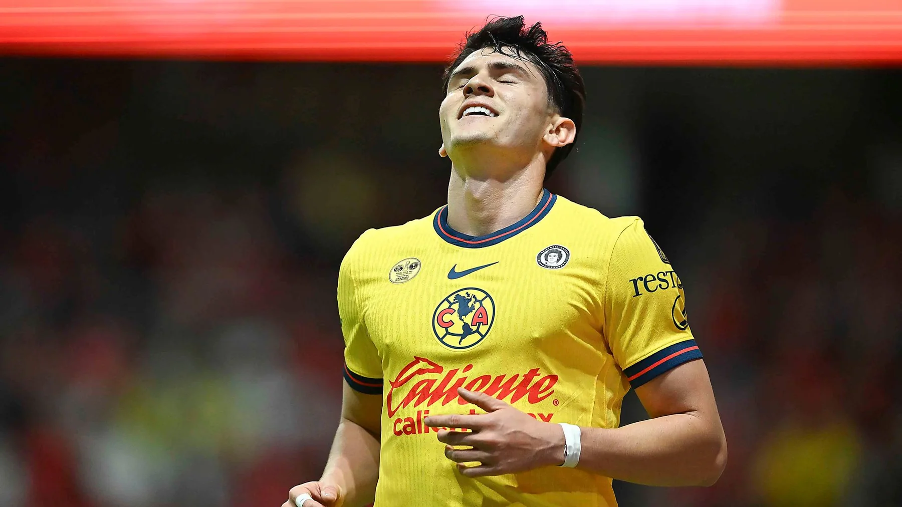 A Club América player during a match illustrating the club's broad digital and cross-border reach
